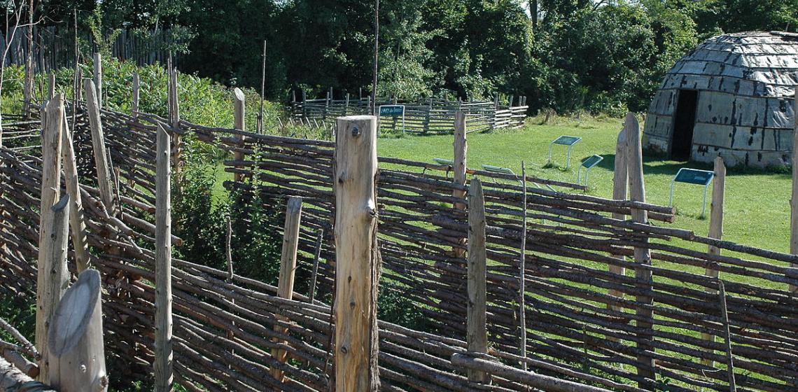 Photo: Longhouse on the Lawson Site. Image by Museum of Ontario Archaeology - self-made, CC BY-SA 3.0, https://en.wikipedia.org/w/index.php?curid=28170601